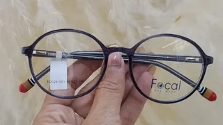 Montura redonda de acetato gris azulado translúcido con terminales de colores, para dama
