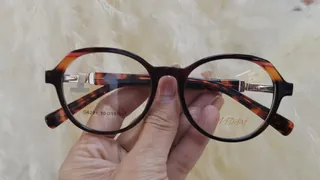Montura redonda de acetato havana oscuro con acentos carey, para dama