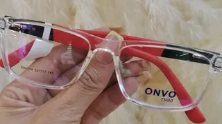 Montura rectangular cristal transparente con varillas rojas, para caballero