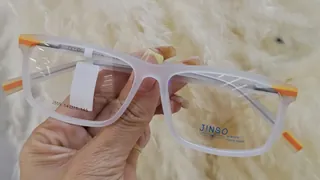 Montura rectangular de acetato blanco esmerilado con franjas naranja y amarilla, para caballero